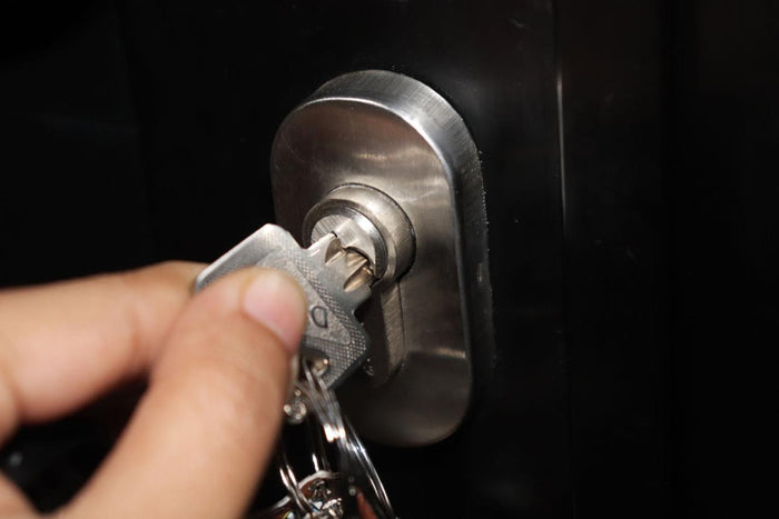 Traditional door lock compared with a Tuya smart lock