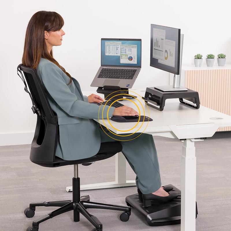 Ergonomic desk setup with a monitor arm